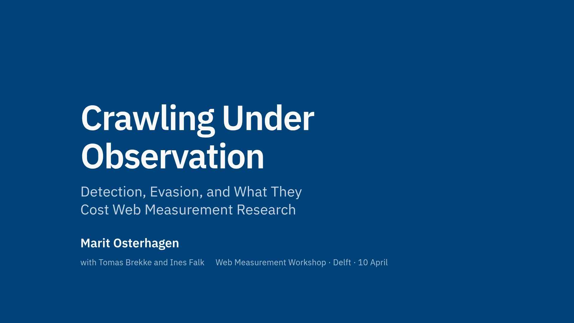 A title slide with white type reversed out of a full field of deep blue.